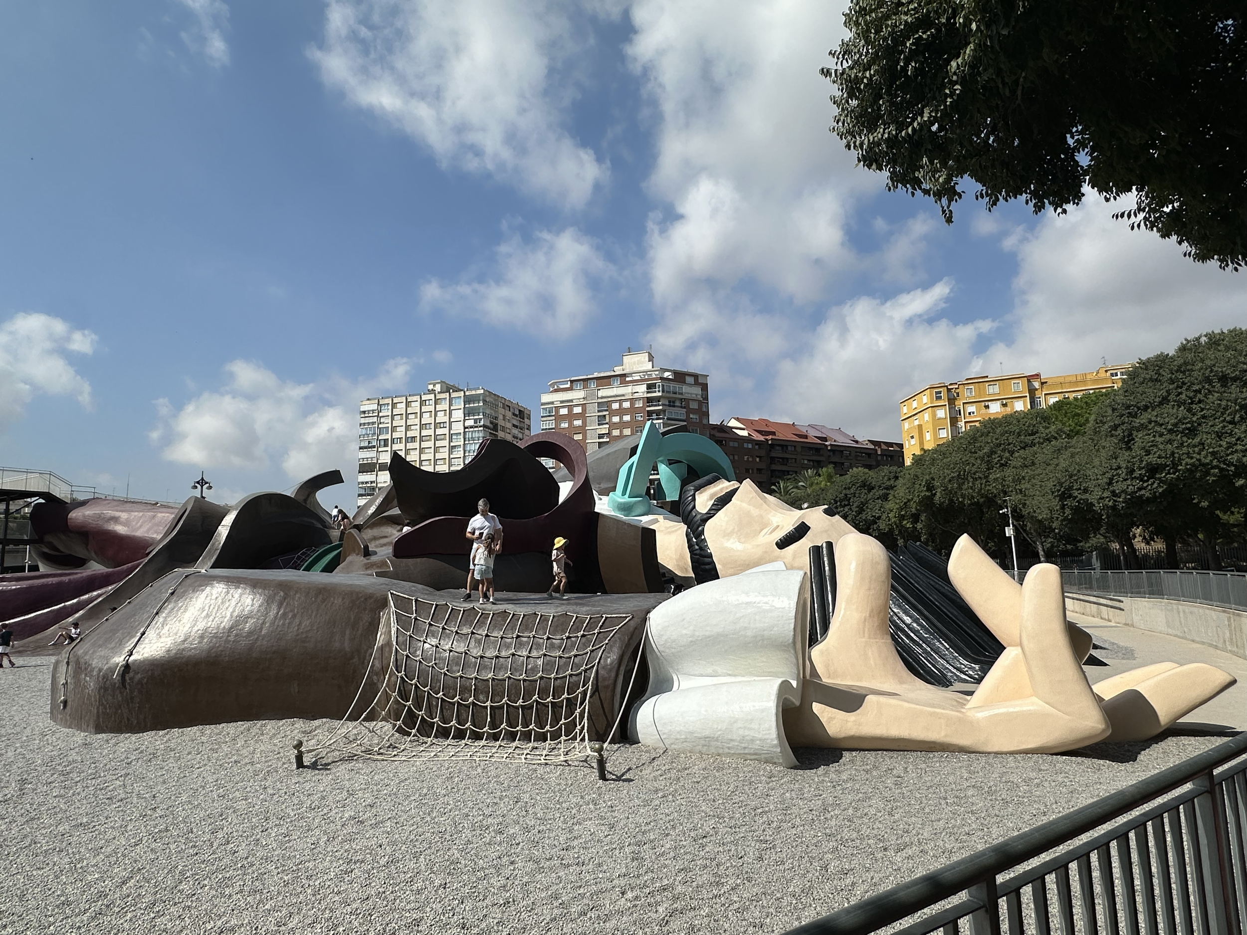 Rope climbing up Gulliver's arm and slides down his coat.