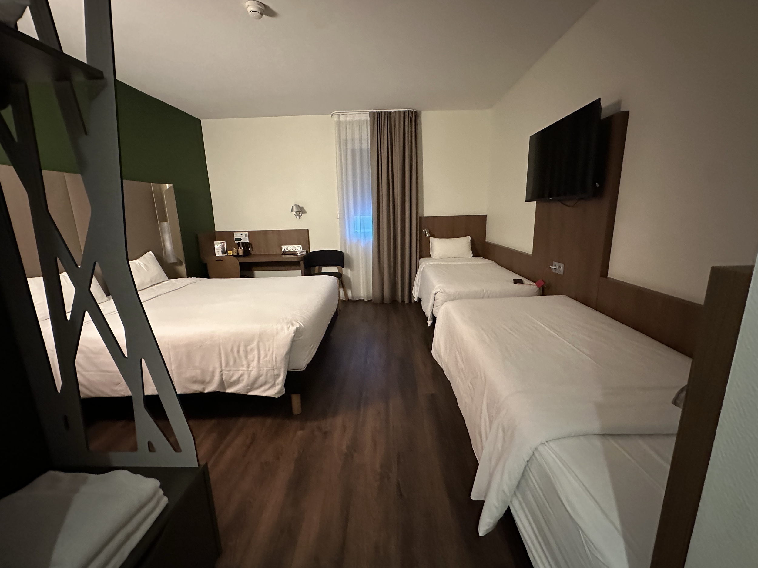 Family rooms always seem to be a creative set-up. The twin beds along one wall actually worked quite well for us.