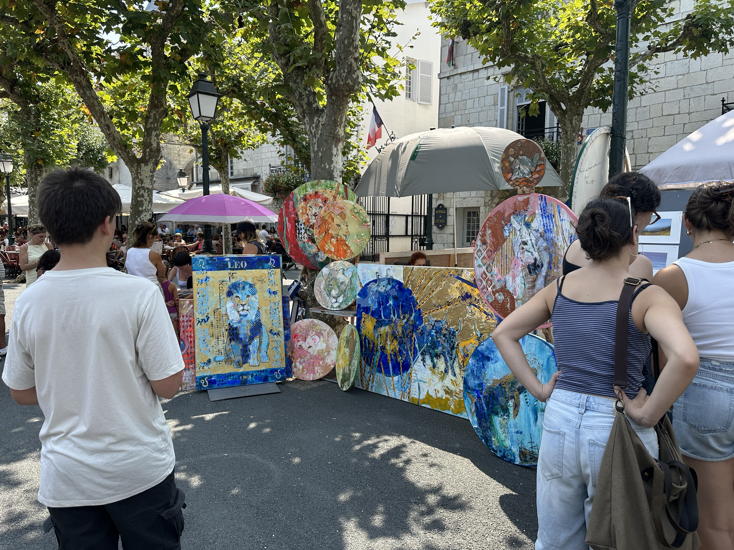 As we walked along the streets, we came across an art market and fell in love with these paintings.  