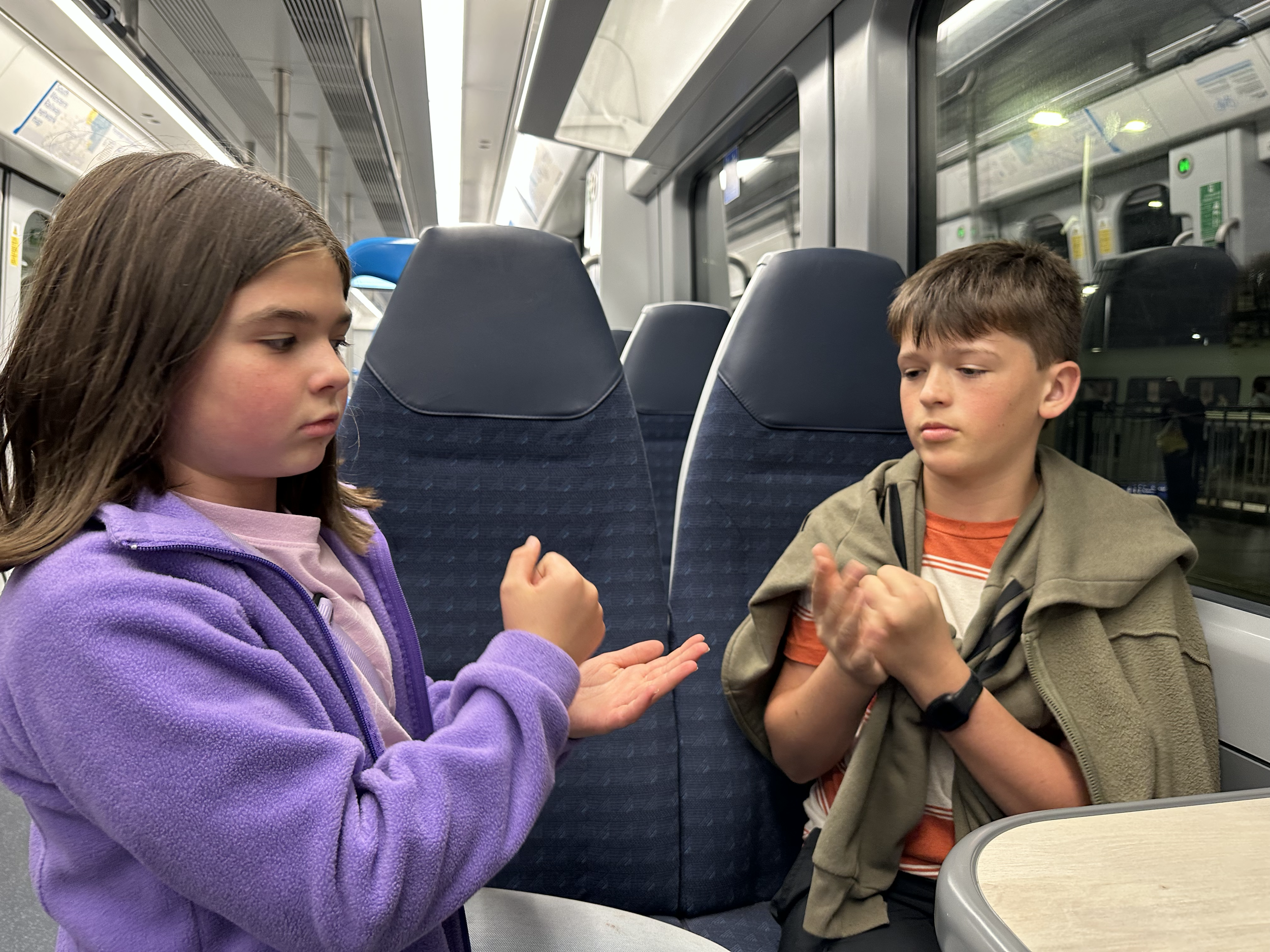Joshua and Amelia entertained themselves with handgames whenever they had downtime. Train-time was the perfect opportunity!