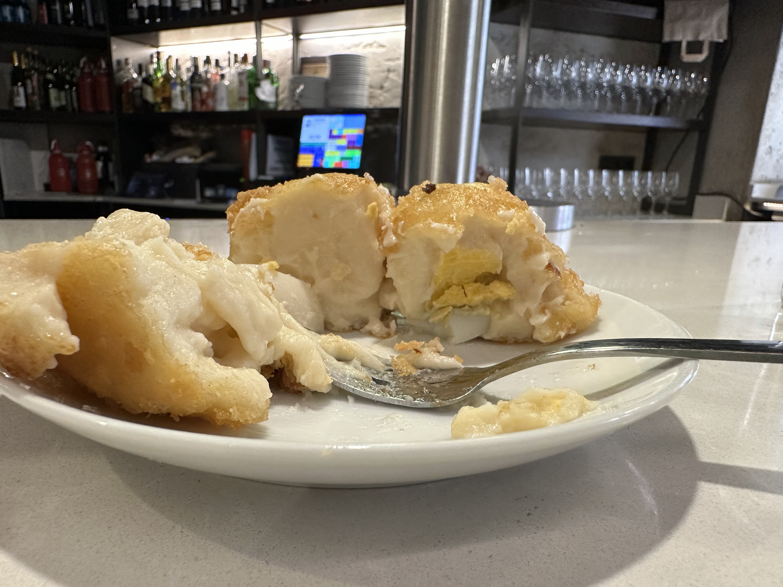 The famous "Fritos Clasicos Huevo." is a boiled egg fried in batter like a croquette. It was delicious.