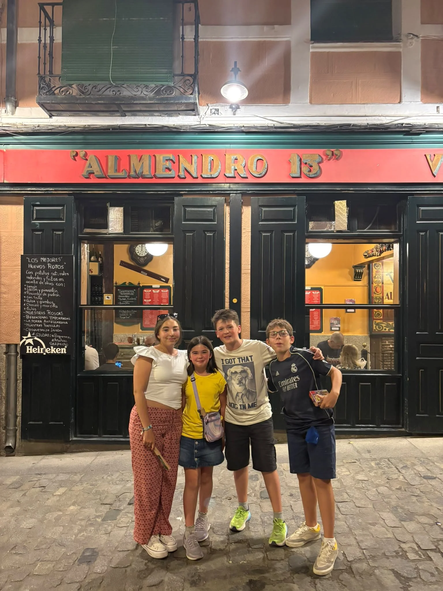 The kids in front of Alemendro 13.