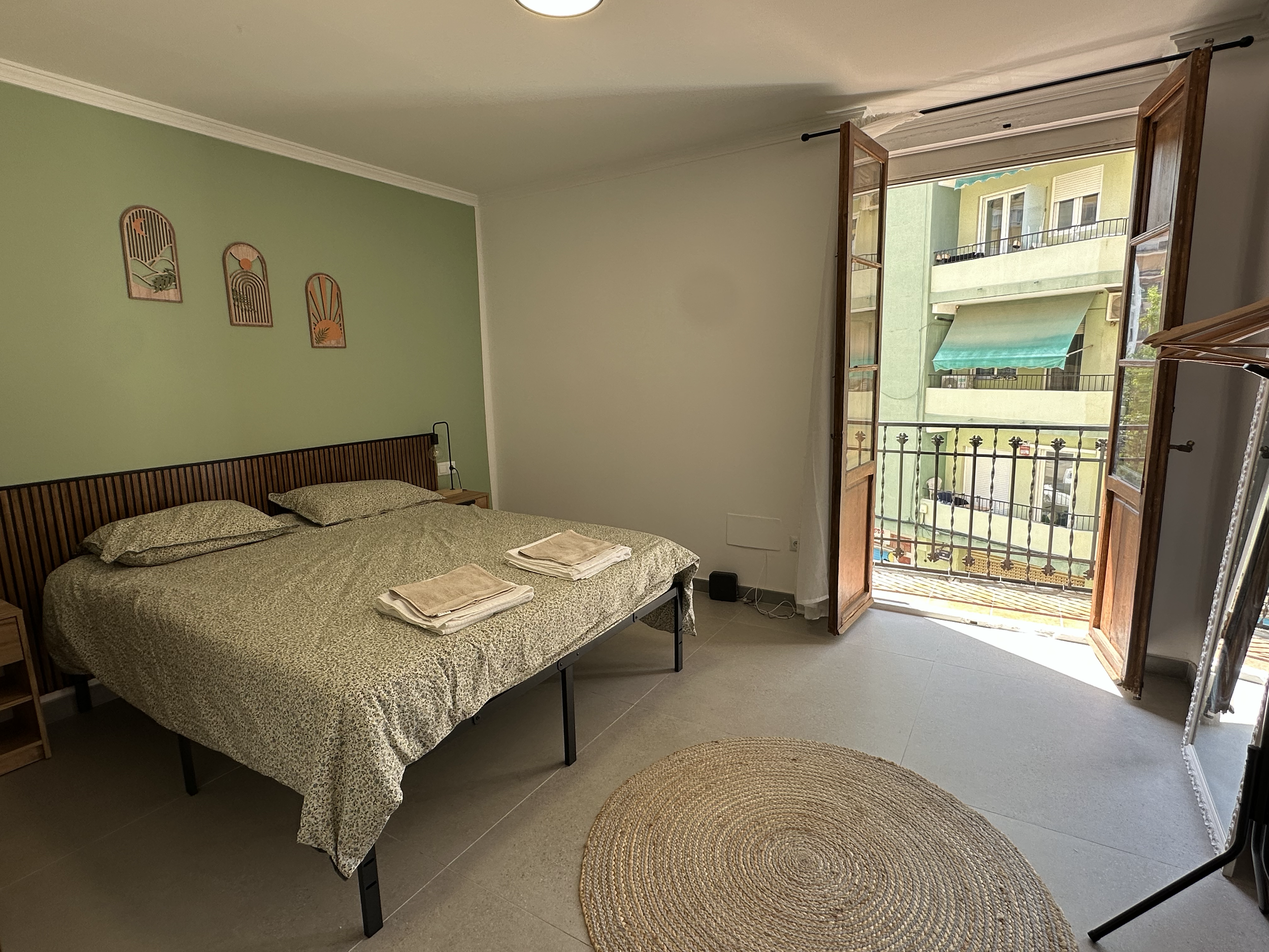 A sweet little balcony off the master bedroom