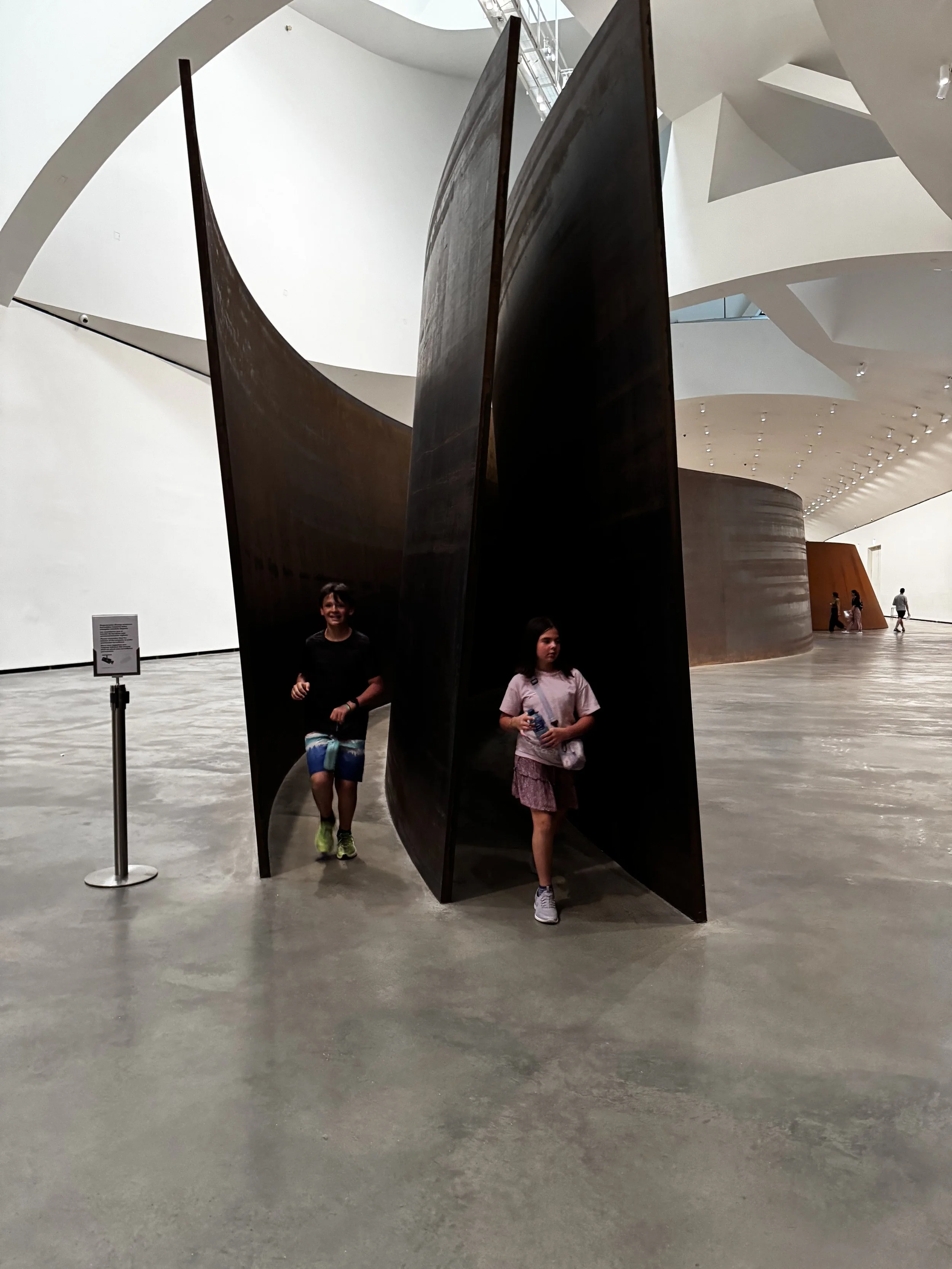 Running through a more-than-lifesized piece of art at the Guggenheim Bilbao. (This was a dizzying experience). 
