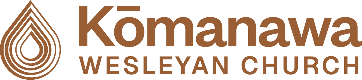 Logo of Kōmanawa Wesleyan Church with stylized brown teardrop shape and text.
