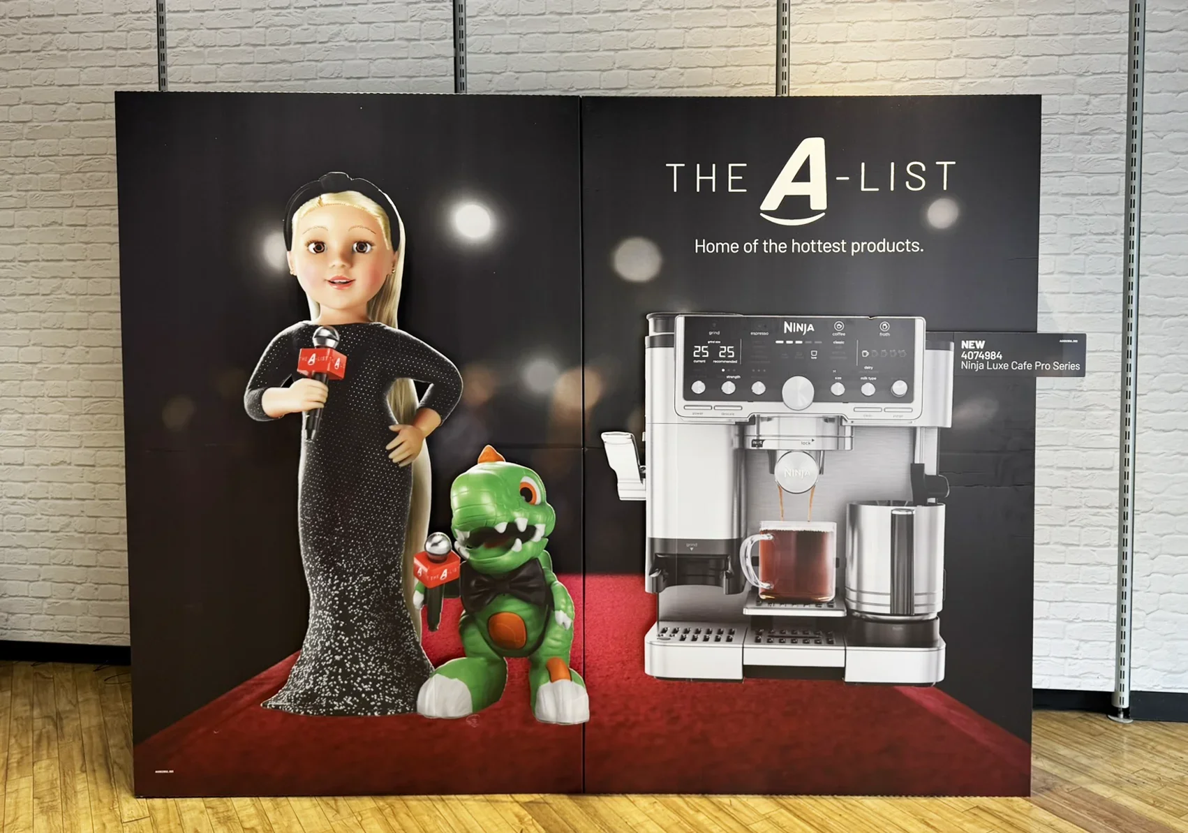Argos POS display showing a coffee machine and some toy characters next to it