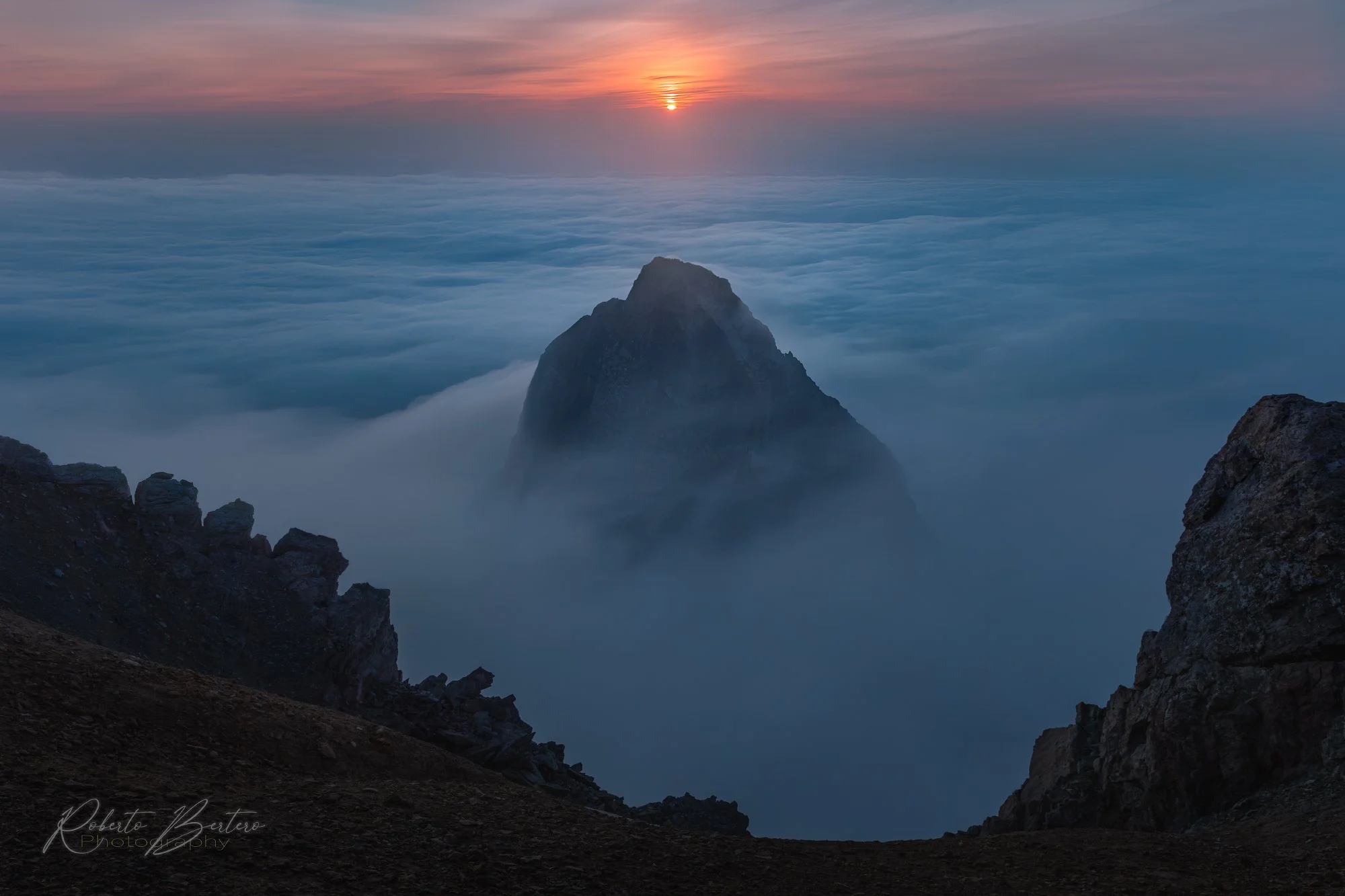 Sunset Over a Sea of C​louds