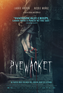 Close-up of a woman's hand holding a bloody knife, wearing a dark jacket and jeans, with a dark background. The movie title"Psycho Wake" is written at the bottom.