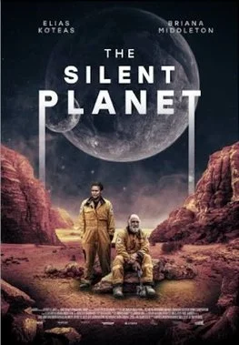Movie poster for 'The Silent Planet' featuring two astronauts in yellow suits on a red rocky terrain with a large moon and dark sky in the background.