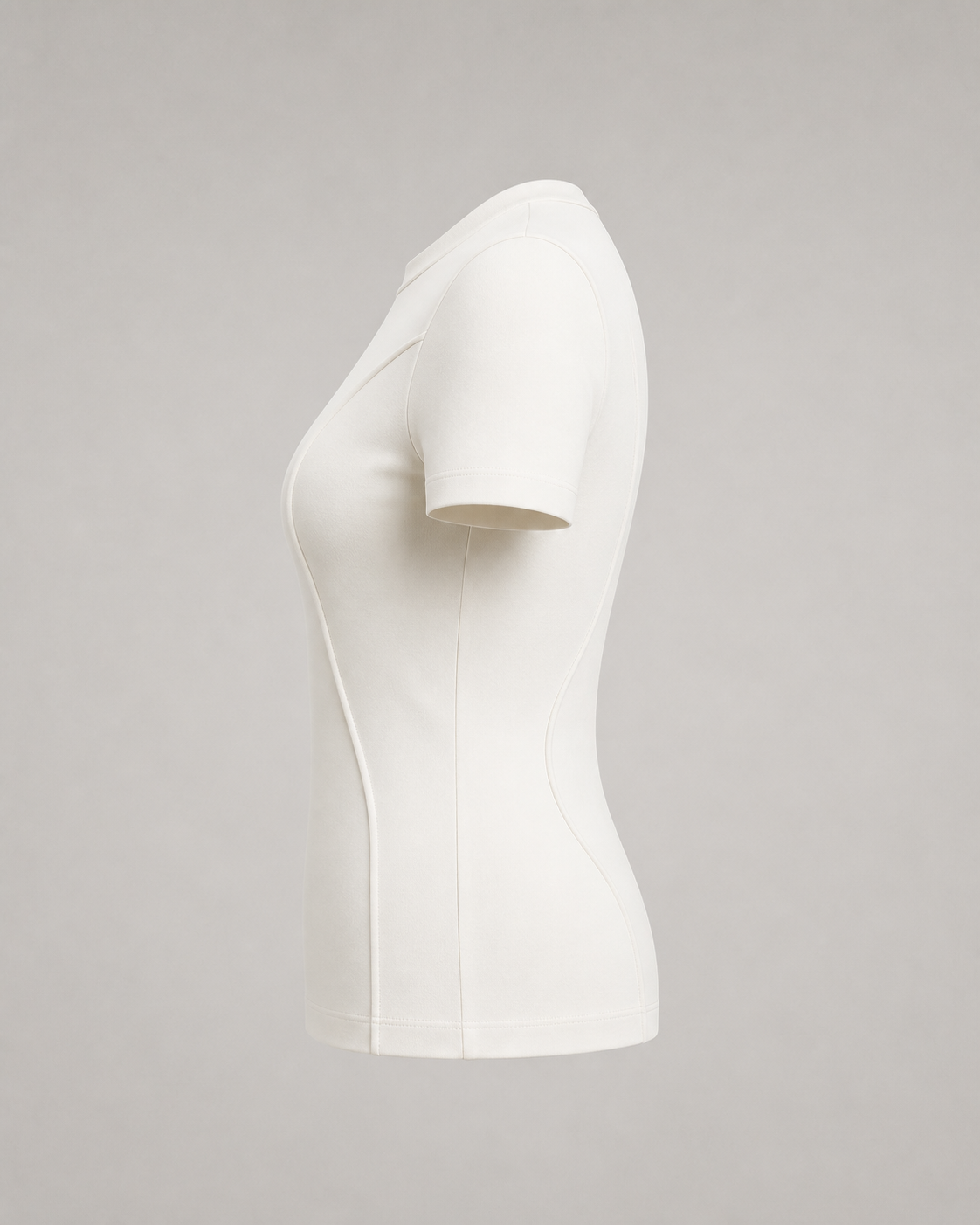 Side view of the Women’s Origin T-Shirt showing its shaped waist and subtly flared hem.