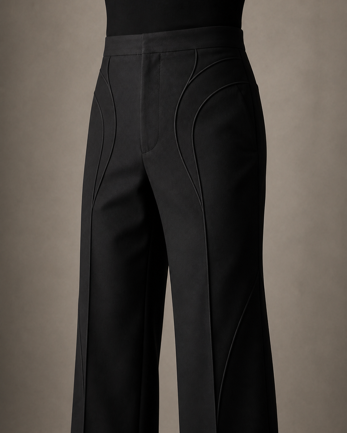 Close view of the Reliquary Trouser’s waistband, hip panelling and curved seam construction.