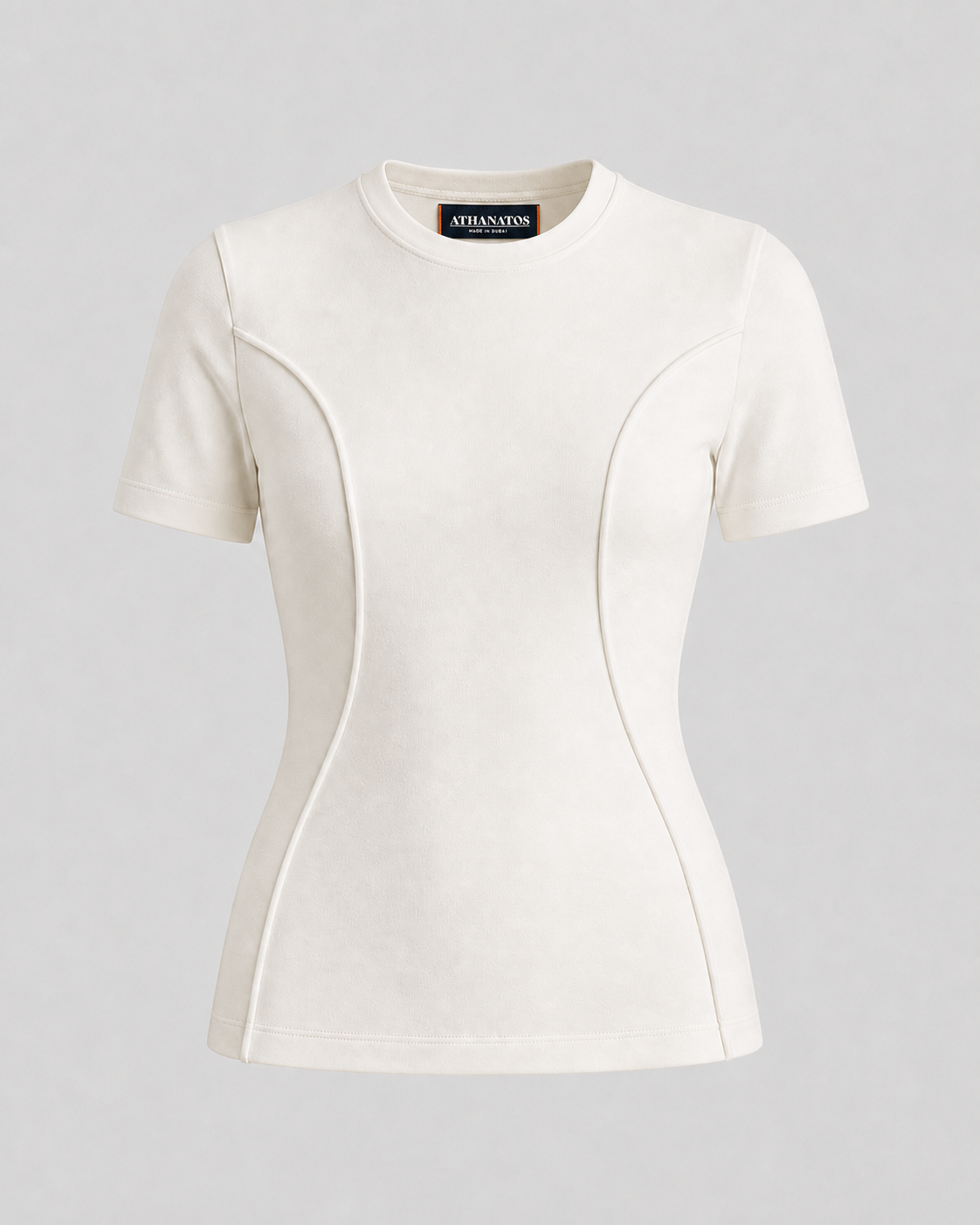 Ivory Athanatos Women’s Origin T-Shirt with curved seams shaping the waist.