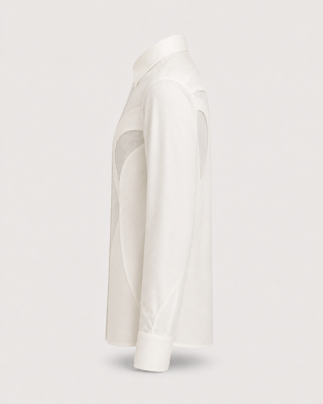 Side view of the black Men’s Origin T-Shirt showing the sculptural panel construction.