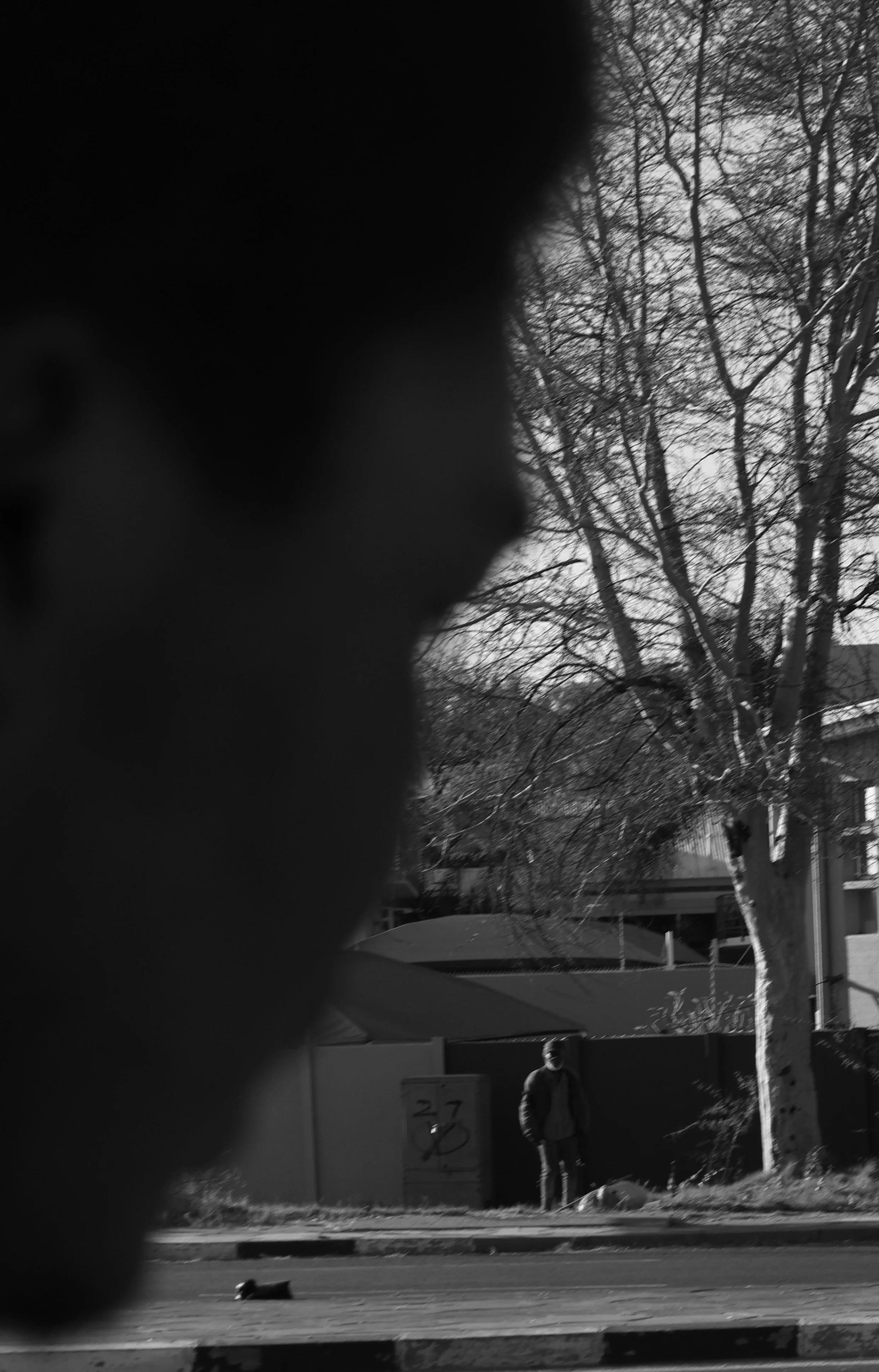 Photograph of men staring each other down