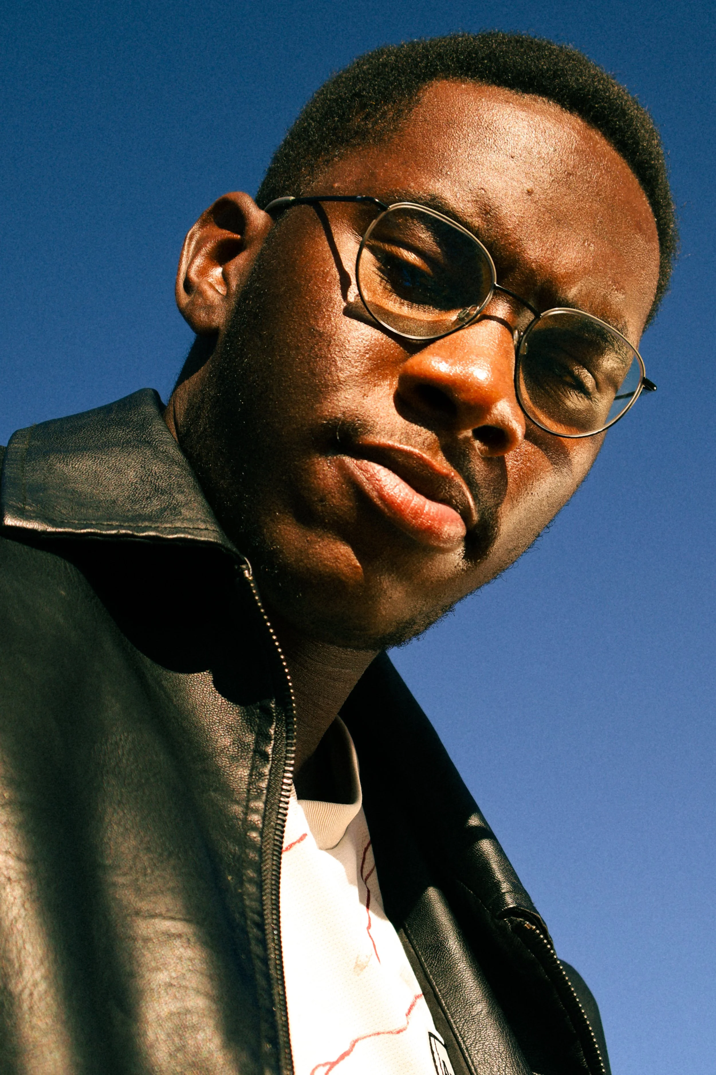 Portrait photograph taken by Kim Kambinda of Eleazar Mwakipesile 