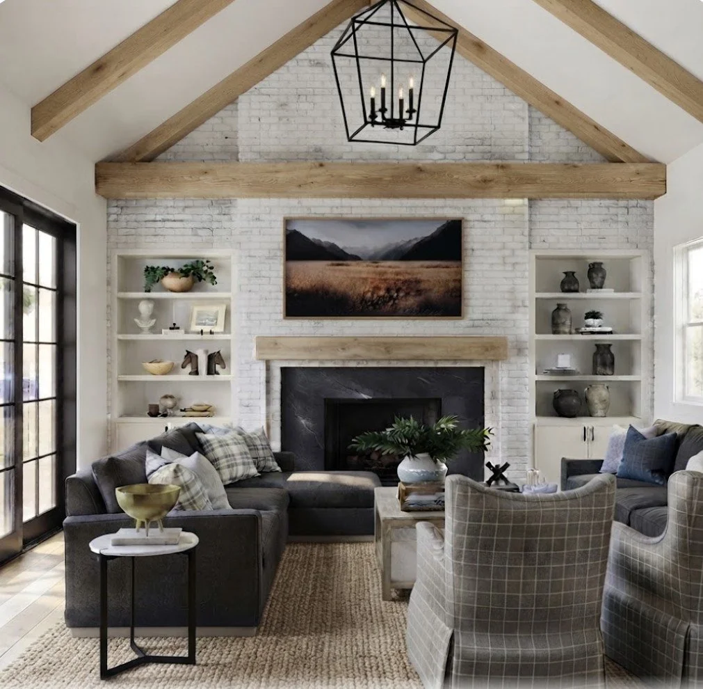 Living room with a white brick fireplace, a large TV above it, and built-in shelves on both sides. There are armchairs, a sofa, and a coffee table with a plant. Wooden beams are on the ceiling, and a large geometric chandelier hangs from the ceiling.
