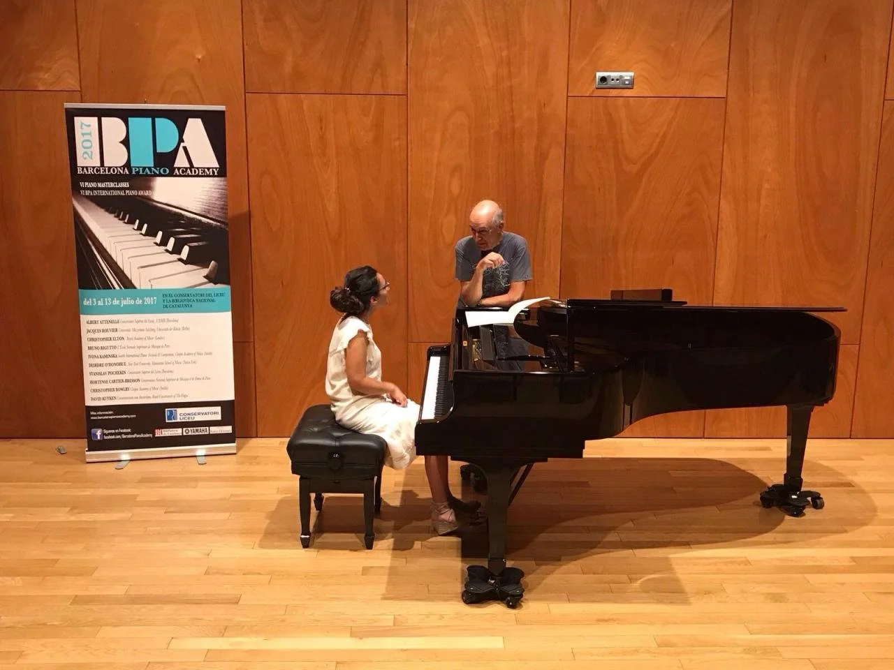 Tinatin Gudadze performing at a grand piano during a masterclass at Barcelona Piano Academy