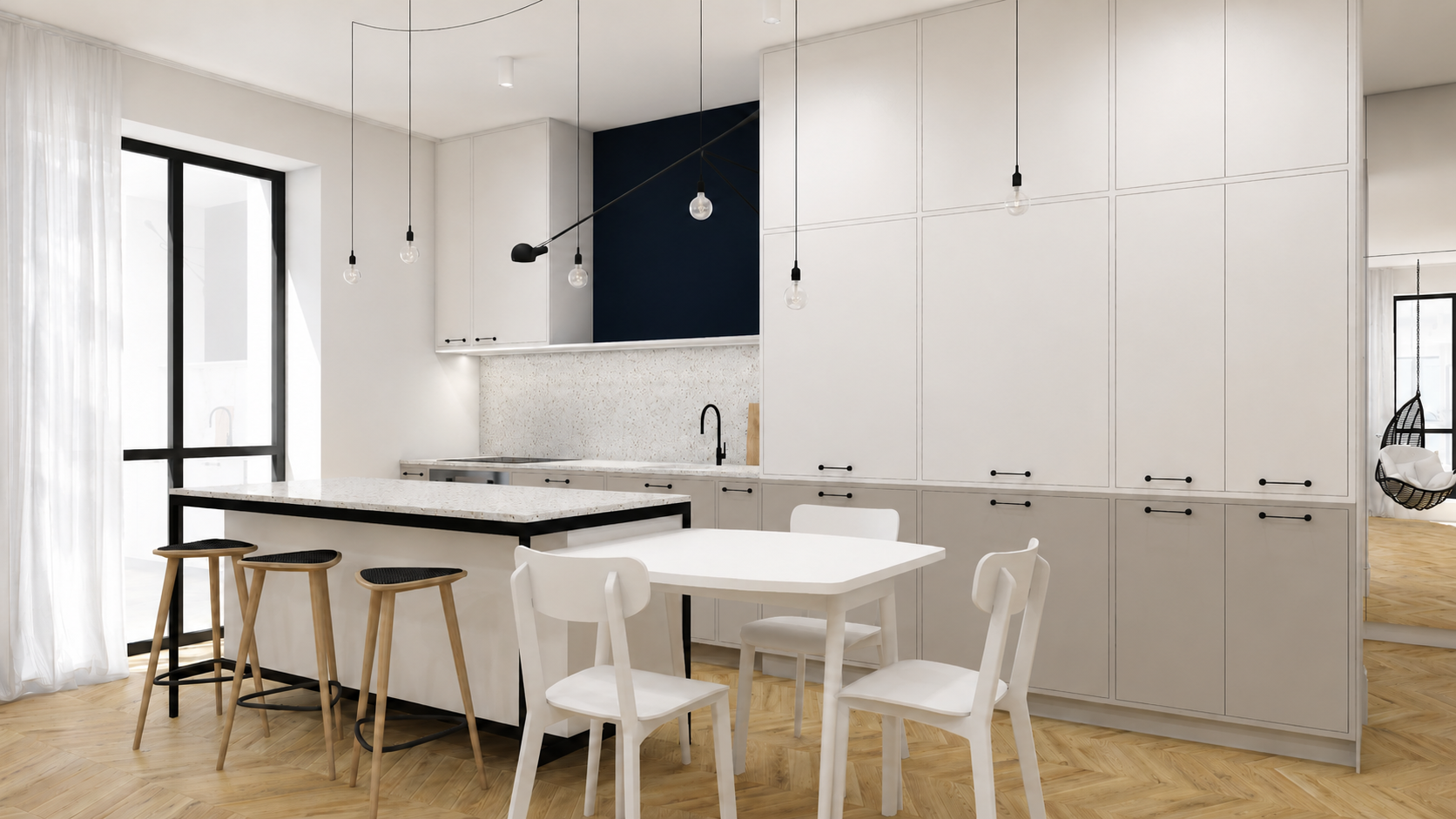 Jasna kuchnia z wyspą, blatem terrazzo, granatową ścianą i czarnymi detalami.