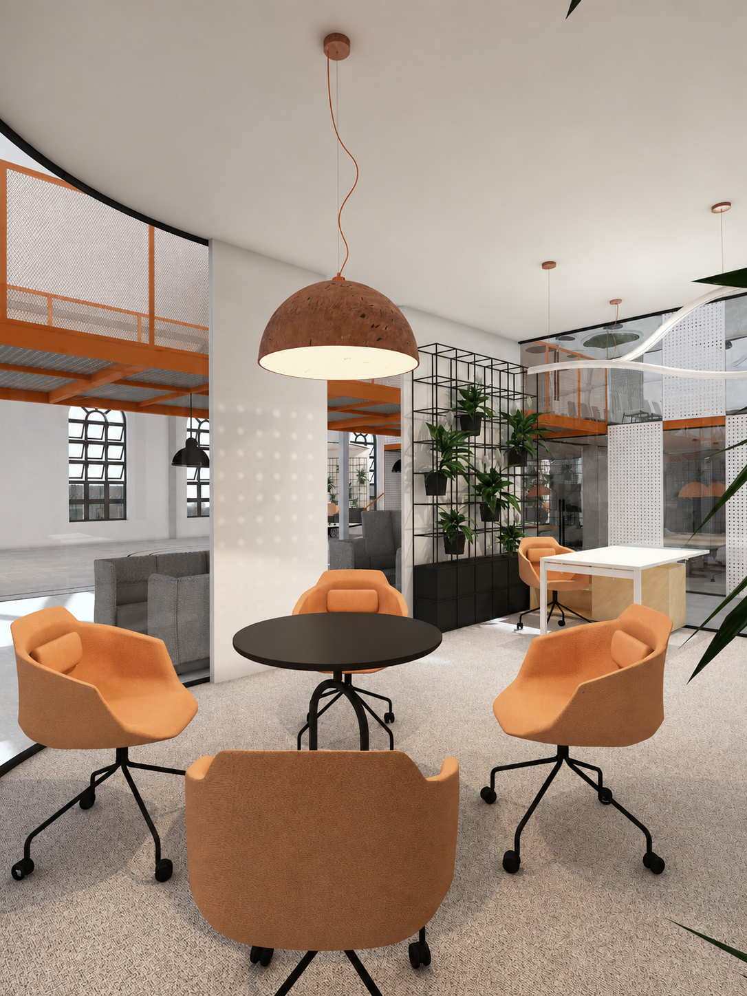 Kameralna strefa spotkań z pomarańczowymi fotelami w projekcie coworkingu