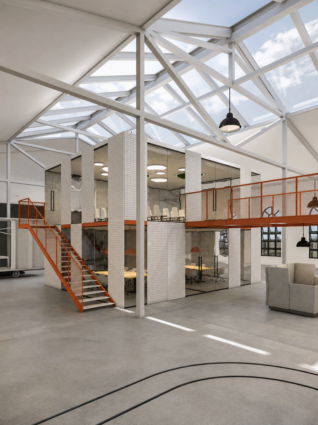 Kameralna strefa spotkań z pomarańczowymi fotelami w projekcie coworkingu