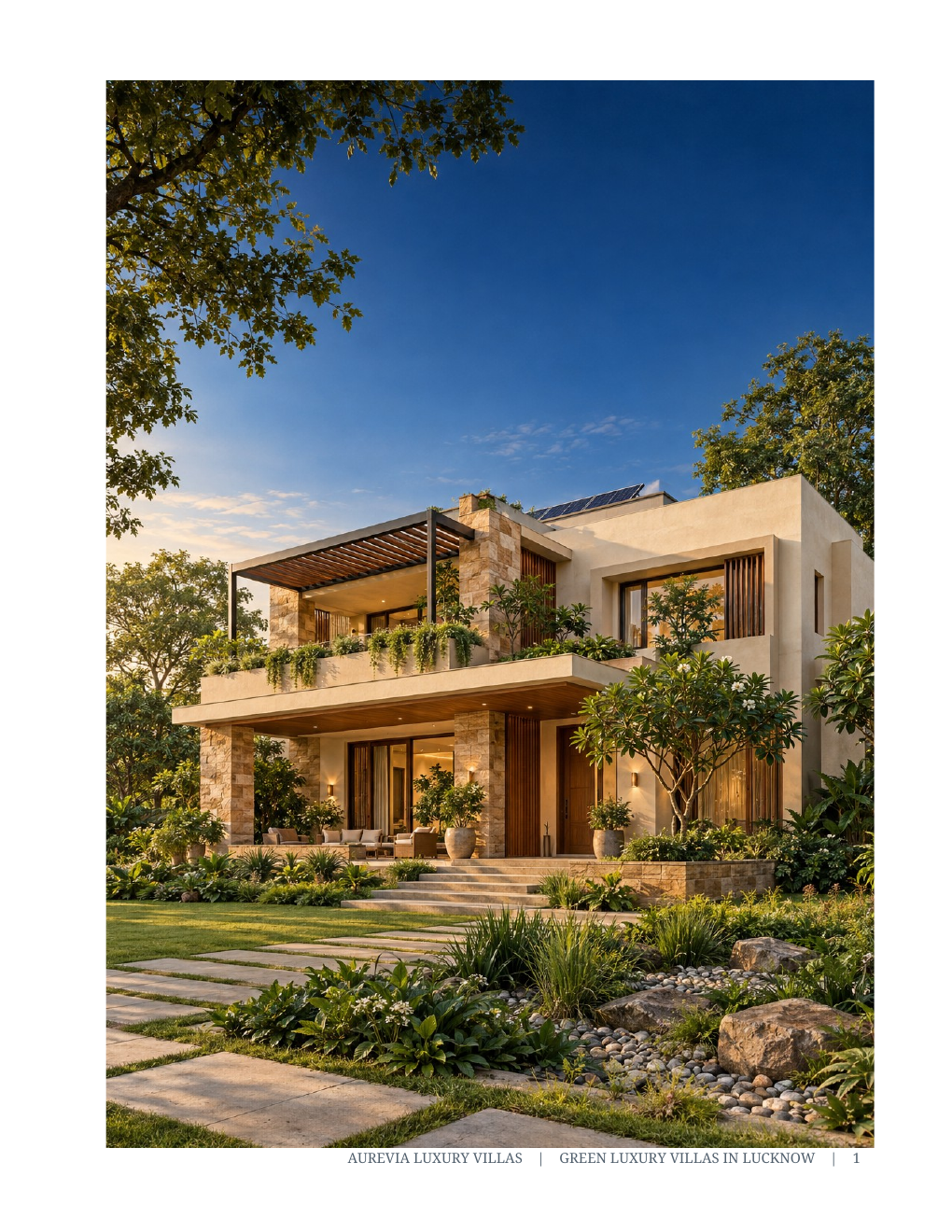 Luxurious modern villa with large balcony, landscaped garden, and stone accents, under a clear blue sky at sunset.