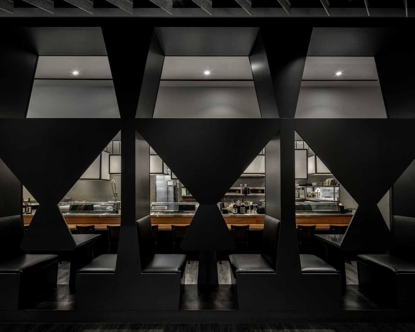 Three two-top booths, each a small room within the screen.