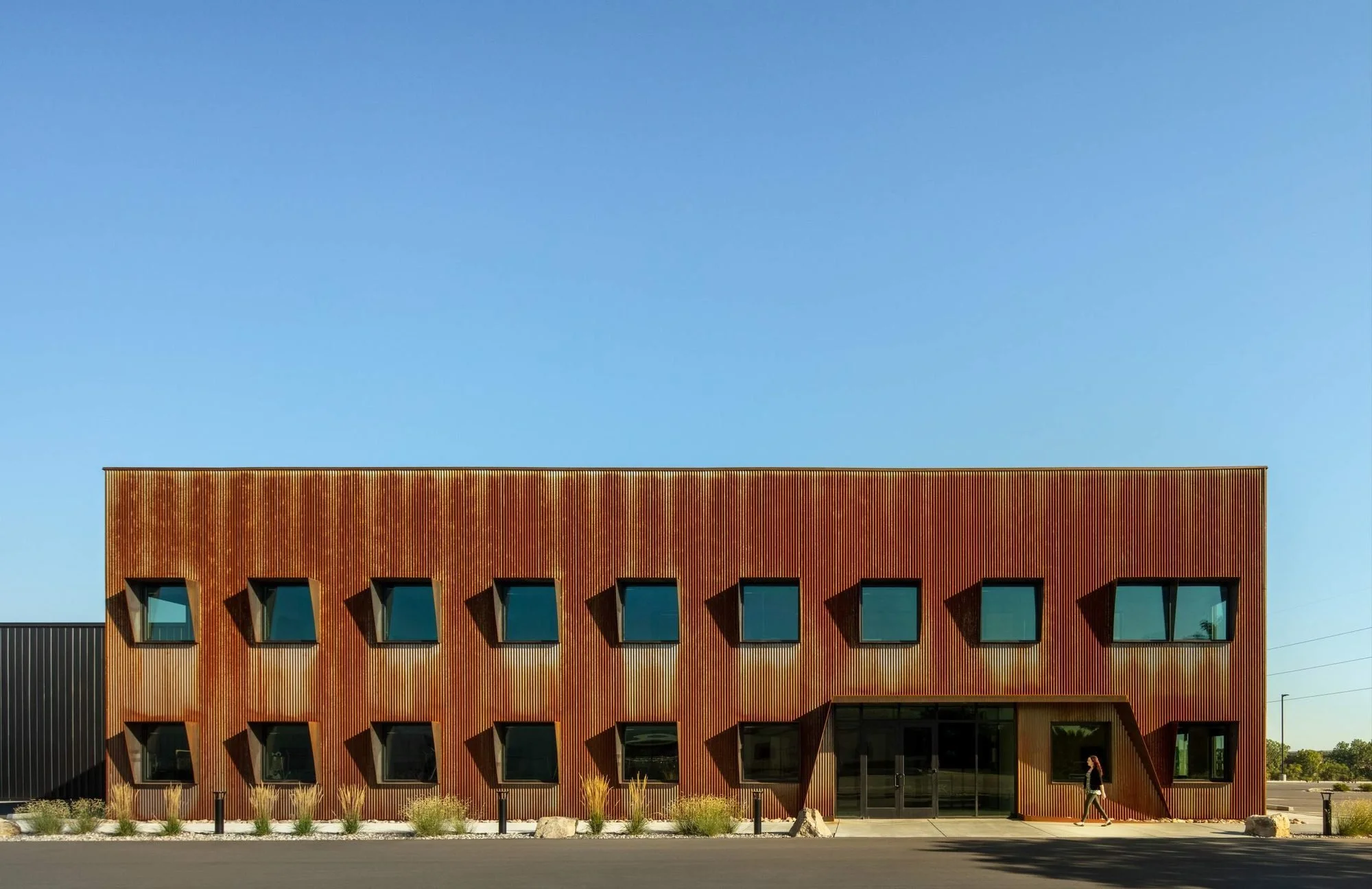 The south facade shades itself while still framing mountain views.