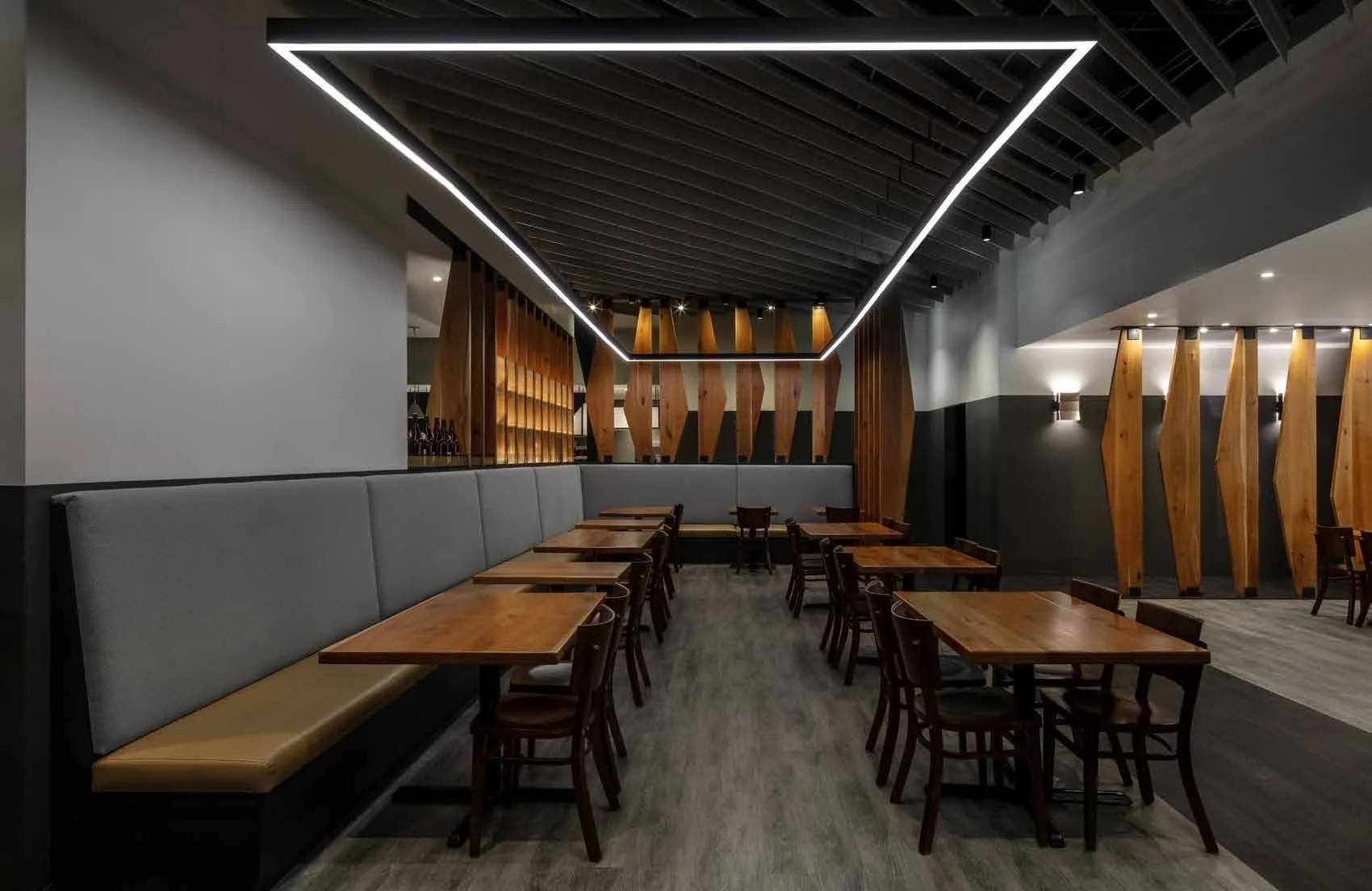 The angle adds interest; the orthogonal grounds the space.