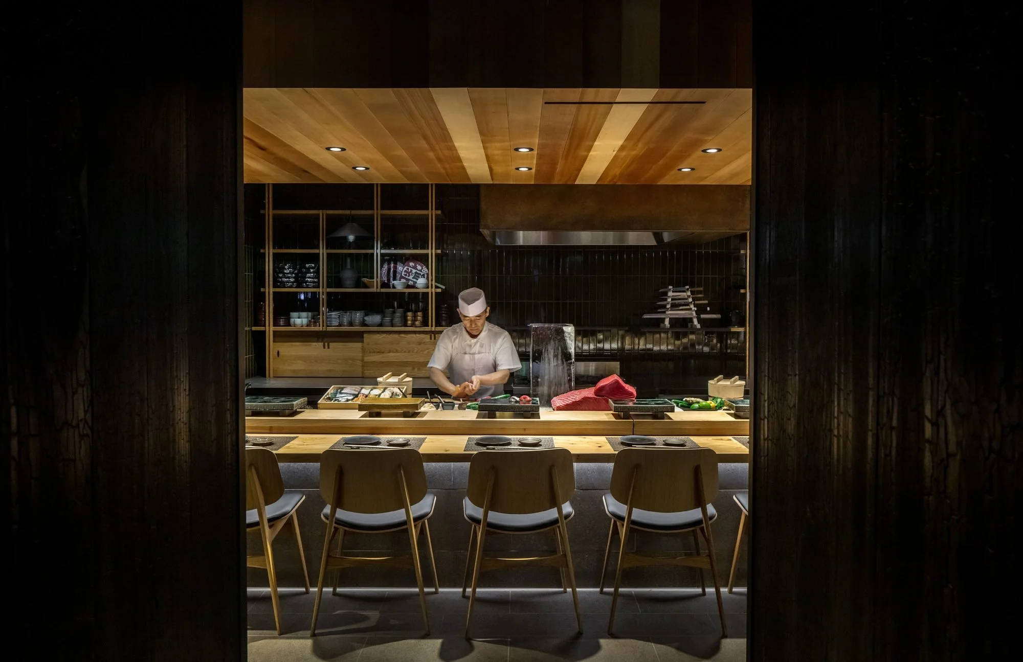 The view across the threshold into Kizaki's omakase counter.
