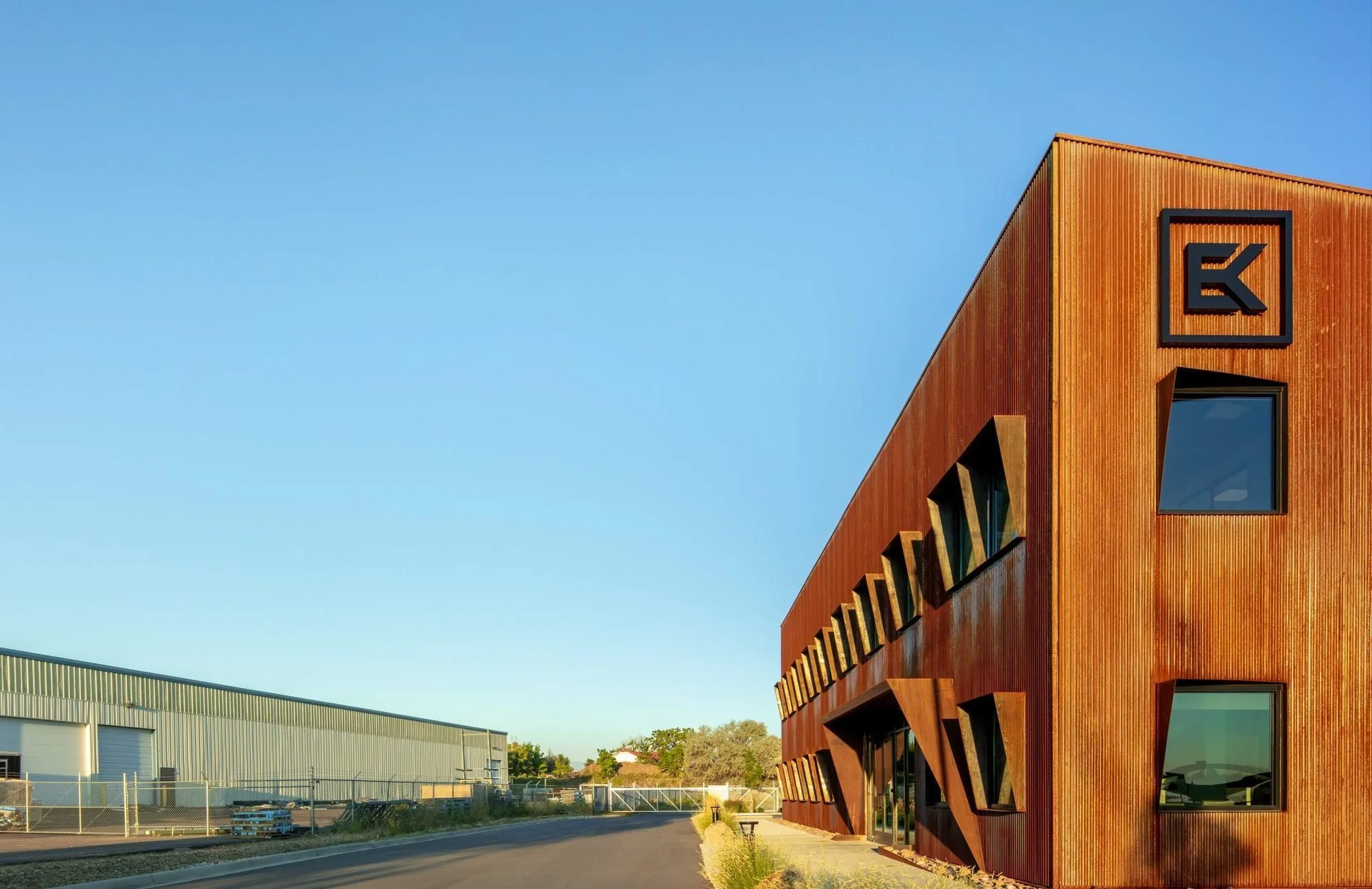 The butterfly roof extends upward to create a prominent south facade.