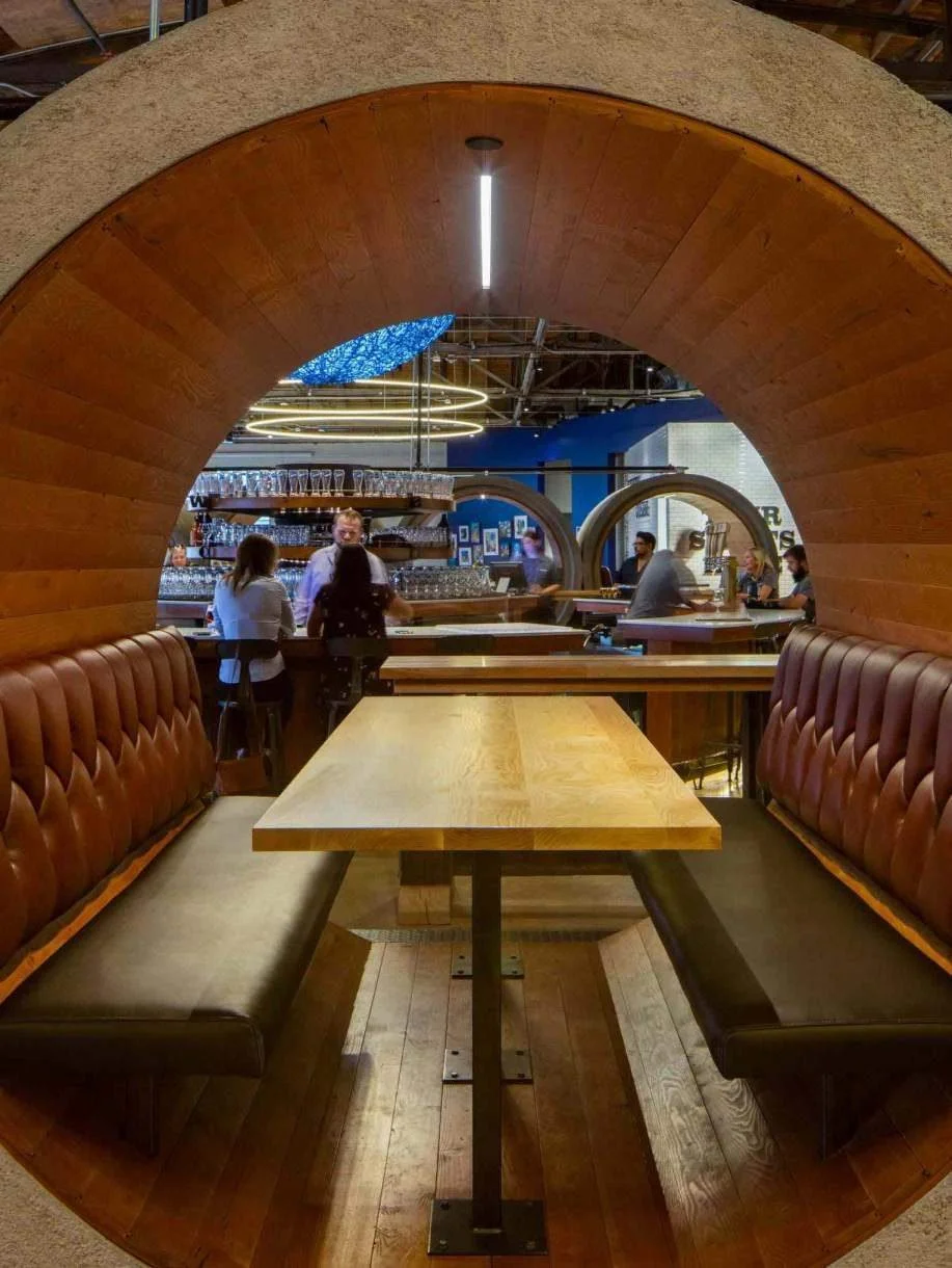 Each booth frames its own view back into the room.