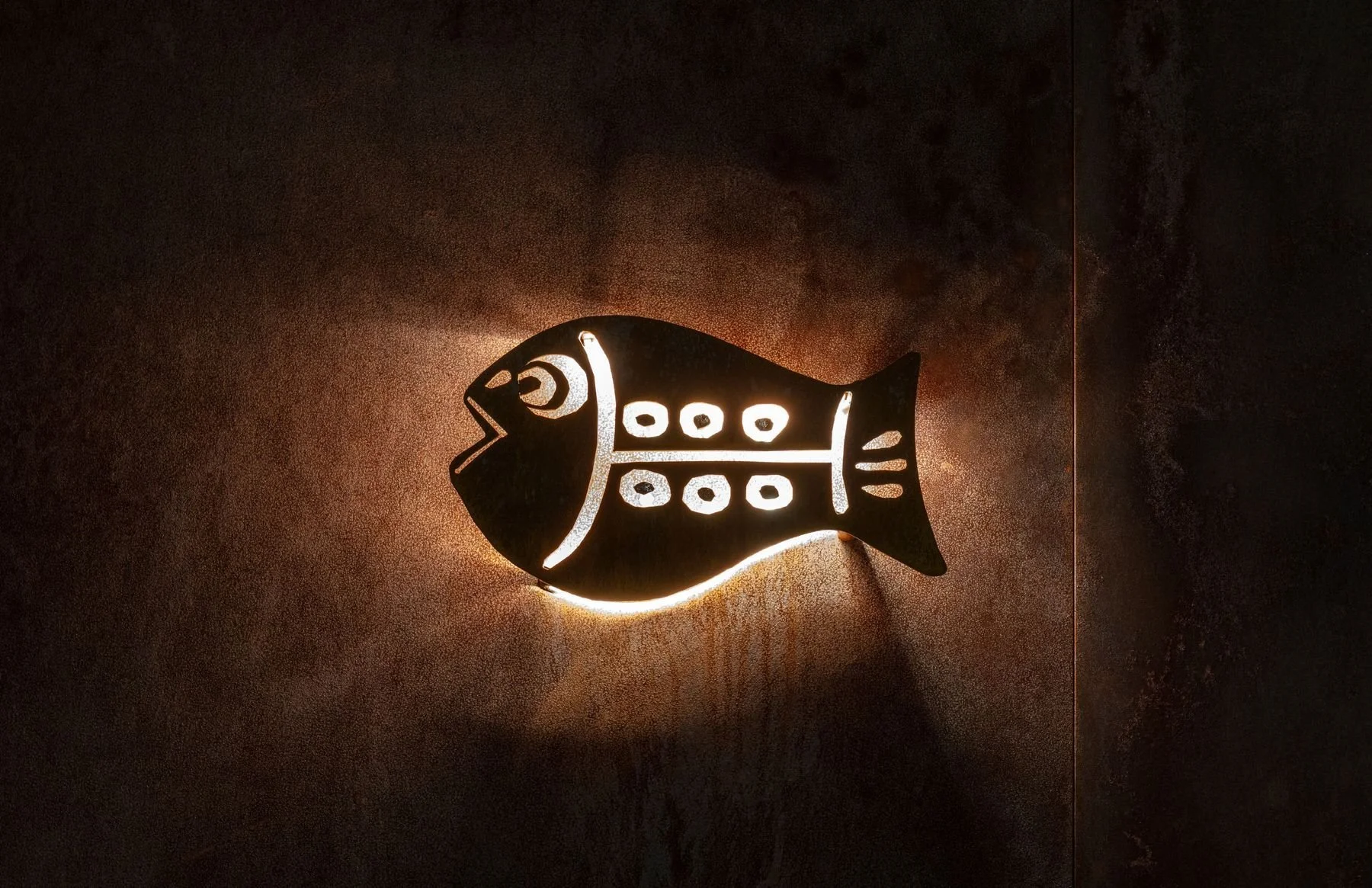 Detail of the fish sconce.