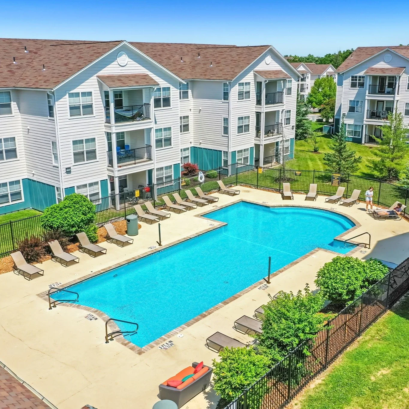 Sunny afternoons hit differently with a resort-style pool and sundeck right outside your door ☀️ Relax, recharge, and make the most of your downtime.
