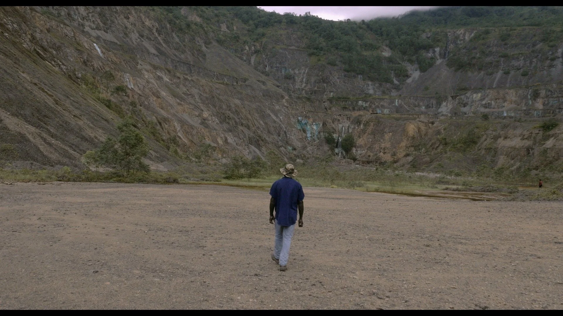 Ophir - Peter walking mine pit.jpg