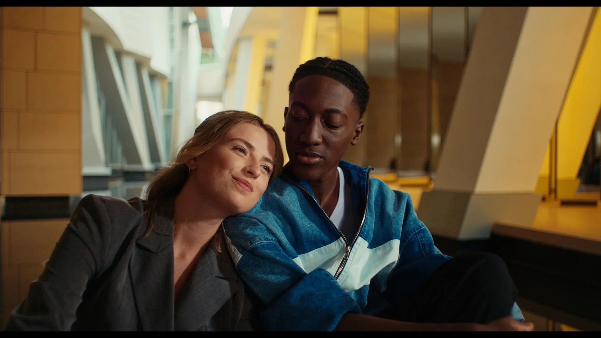 Trait d'Union - Bakary and Alma sitting.jpg