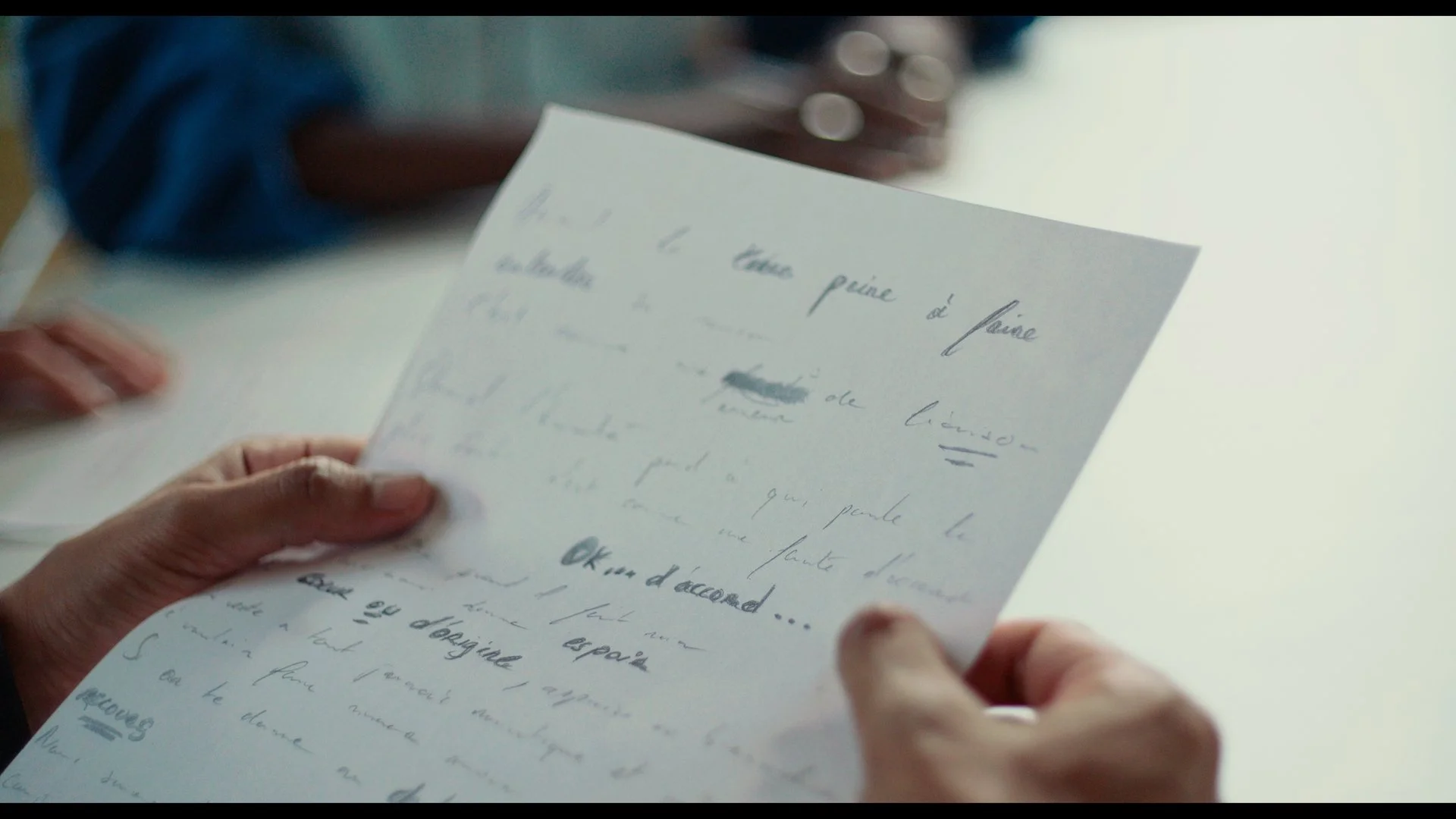 Trait d'Union - Sullivan holding text.jpg