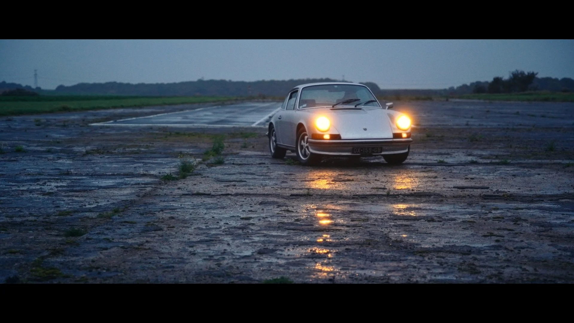 The Automologist - car turning under rain.jpg