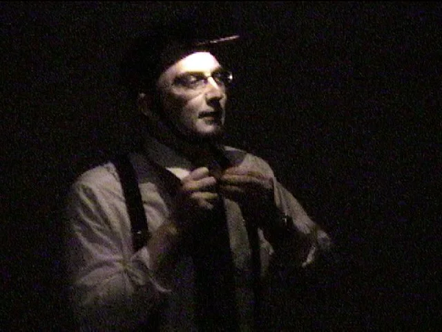 A man tells a story about a funeral.