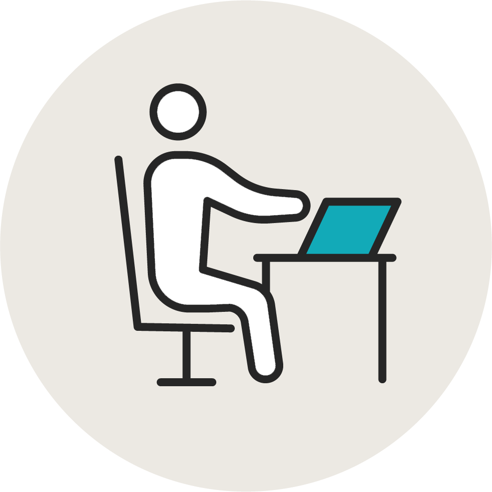 An icon of a person sitting at a desk