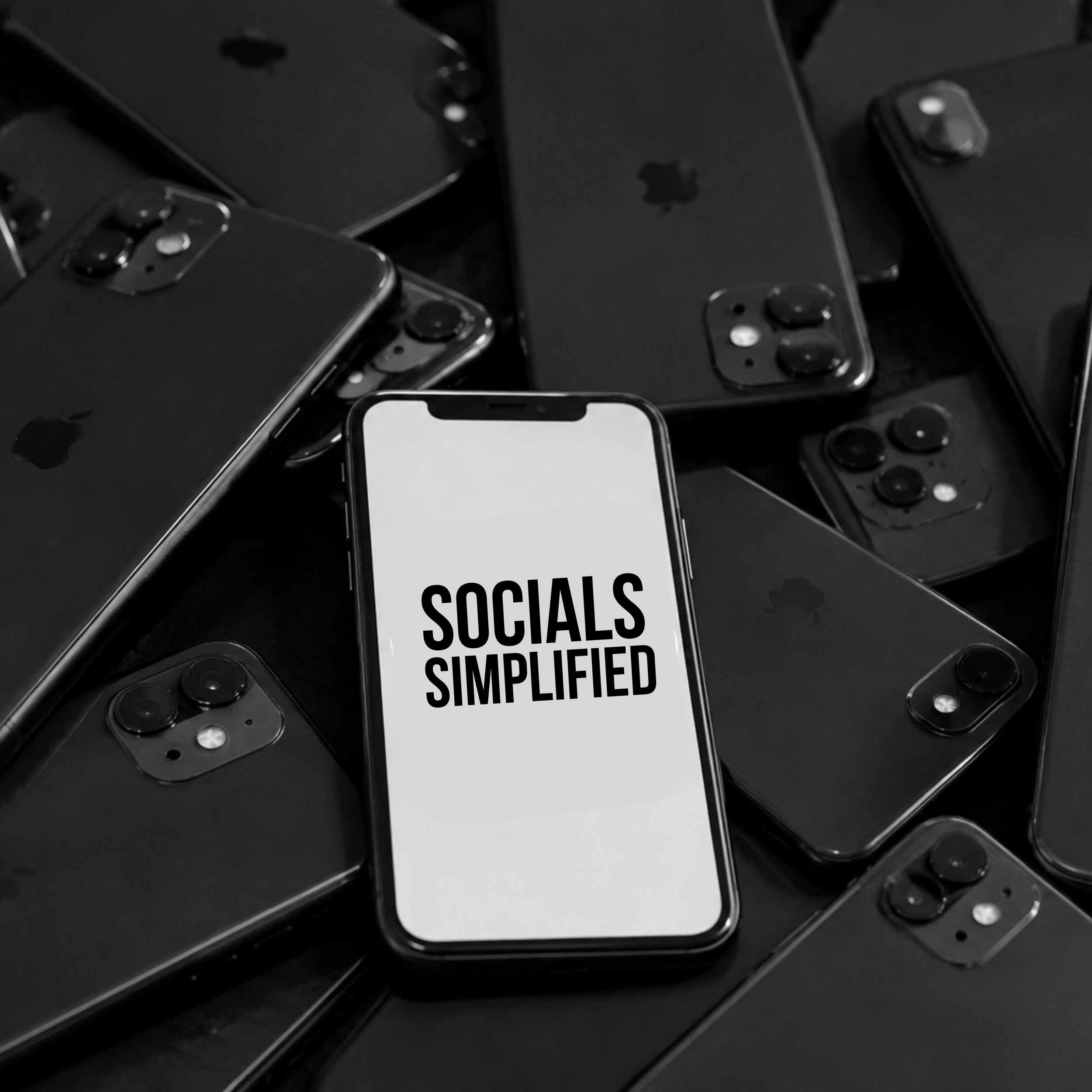 Group of black iPhones with one displaying 'SOCIALS SIMPLIFIED' in black text on a white background, arranged on a dark surface.