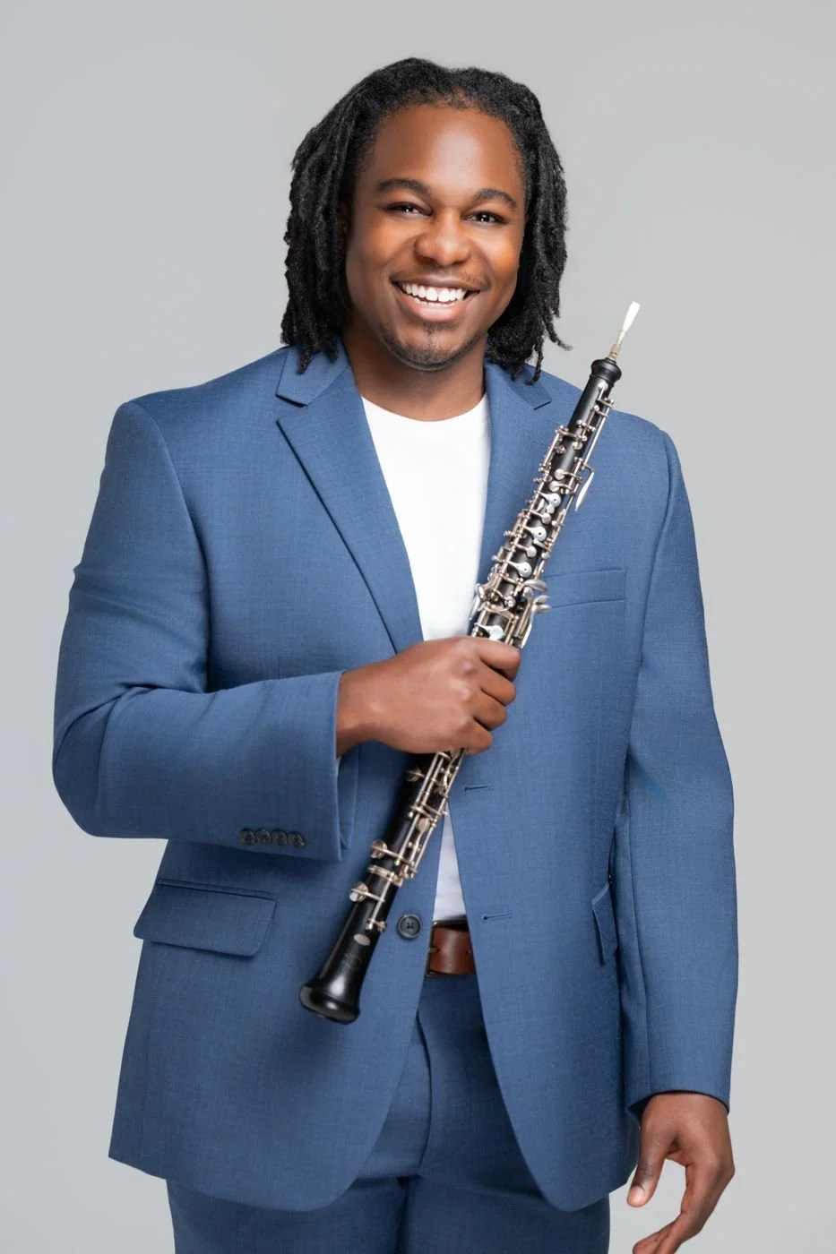 David Norville holding his oboe