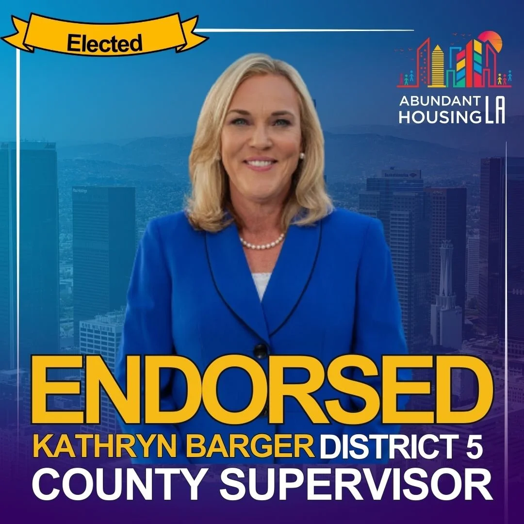 A woman in a blue blazer smiling, with a city skyline in the background. Text indicates she is endorsed as District 5 County Supervisor in LA, elected and endorsed by Abundant Housing LA.