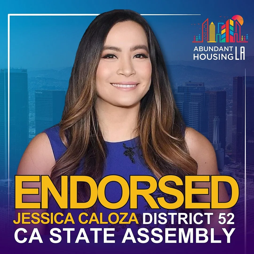 A campaign graphic featuring a woman with long brown hair smiling, wearing a blue dress. The background depicts a city skyline with tall buildings. Text on the image reads "Endorsed Jessica Caloza District 52 CA State Assembly" with a colorful cityscape logo and the words "Abundant Housing LA".