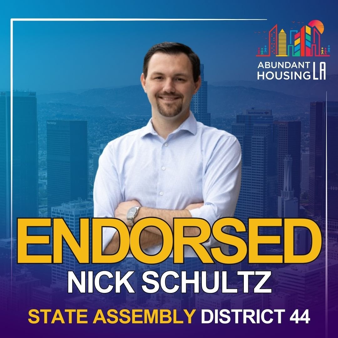 Political campaign poster for Nick Schultz, endorsing him for State Assembly District 44. The poster features a smiling man in a light blue shirt with crossed arms, against a cityscape background. The logo for Abundant Housing LA is in the top right corner.