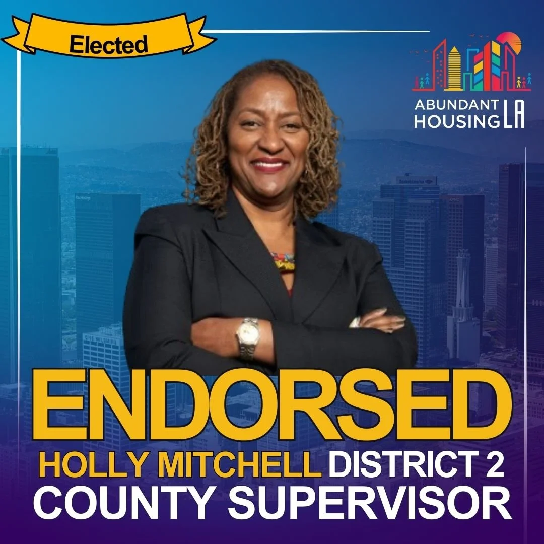 Photo of Holly Mitchell, District 2 County Supervisor, with a city skyline background, supporting her endorsement with text overlay reading 'ENDORSED HOLLY MITCHELL DISTRICT 2 COUNTY SUPERVISOR'.