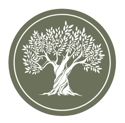 A stylized, white illustration of a large tree with twisting branches and numerous leaves, enclosed within a circular border on a green background.