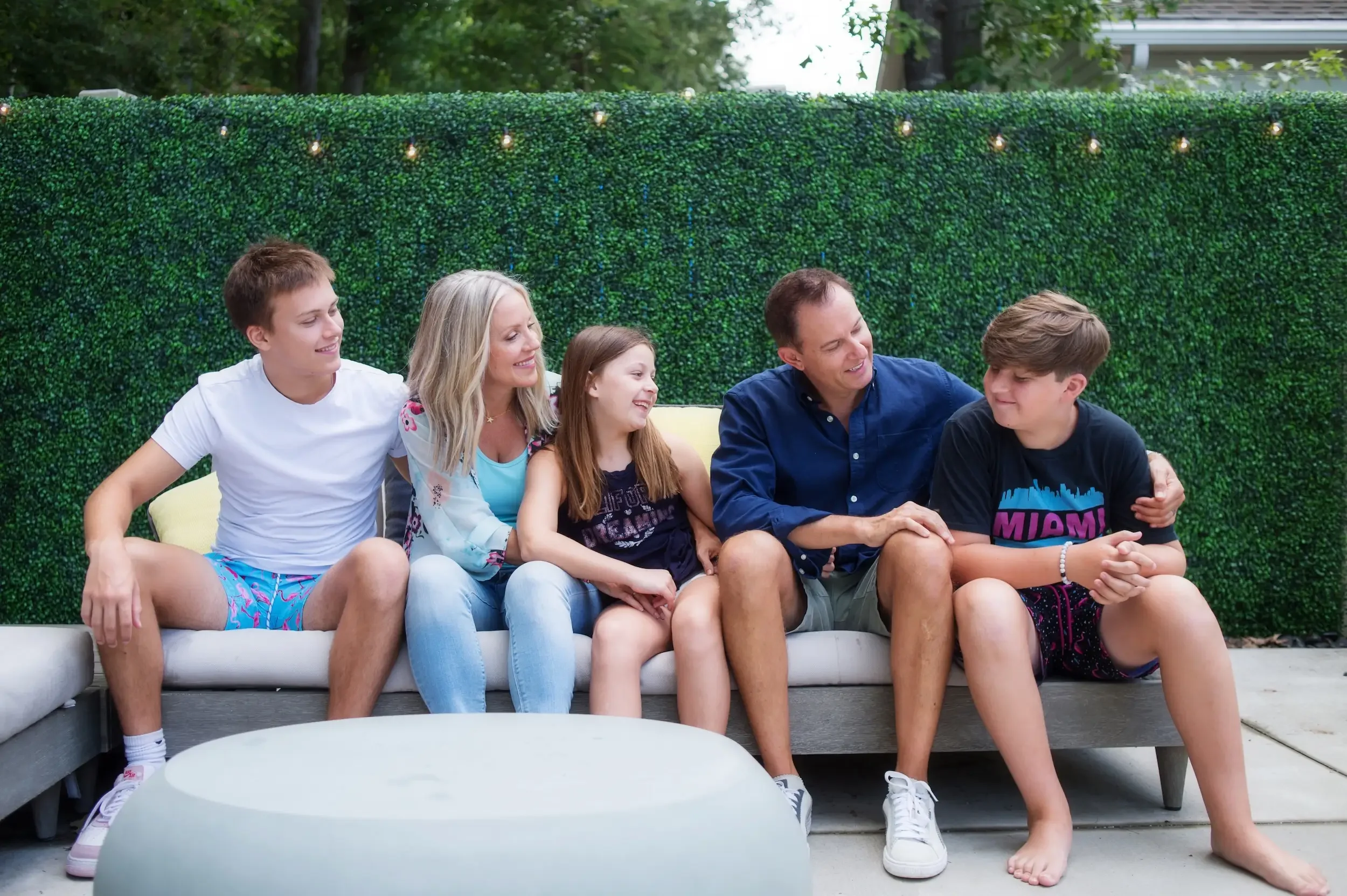 Angie Mizzell with her family in her garden.