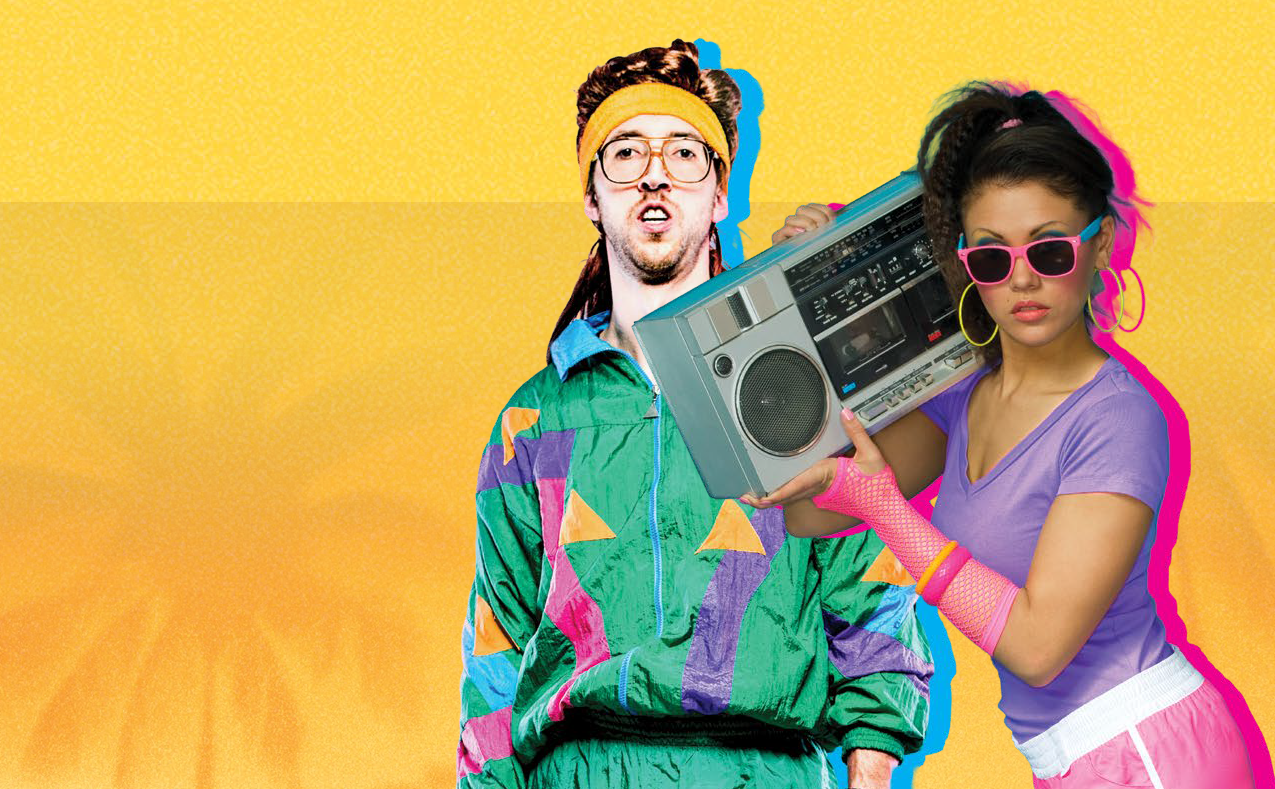 Two people dressed in 80s style clothing posing with a boombox against a yellow background.