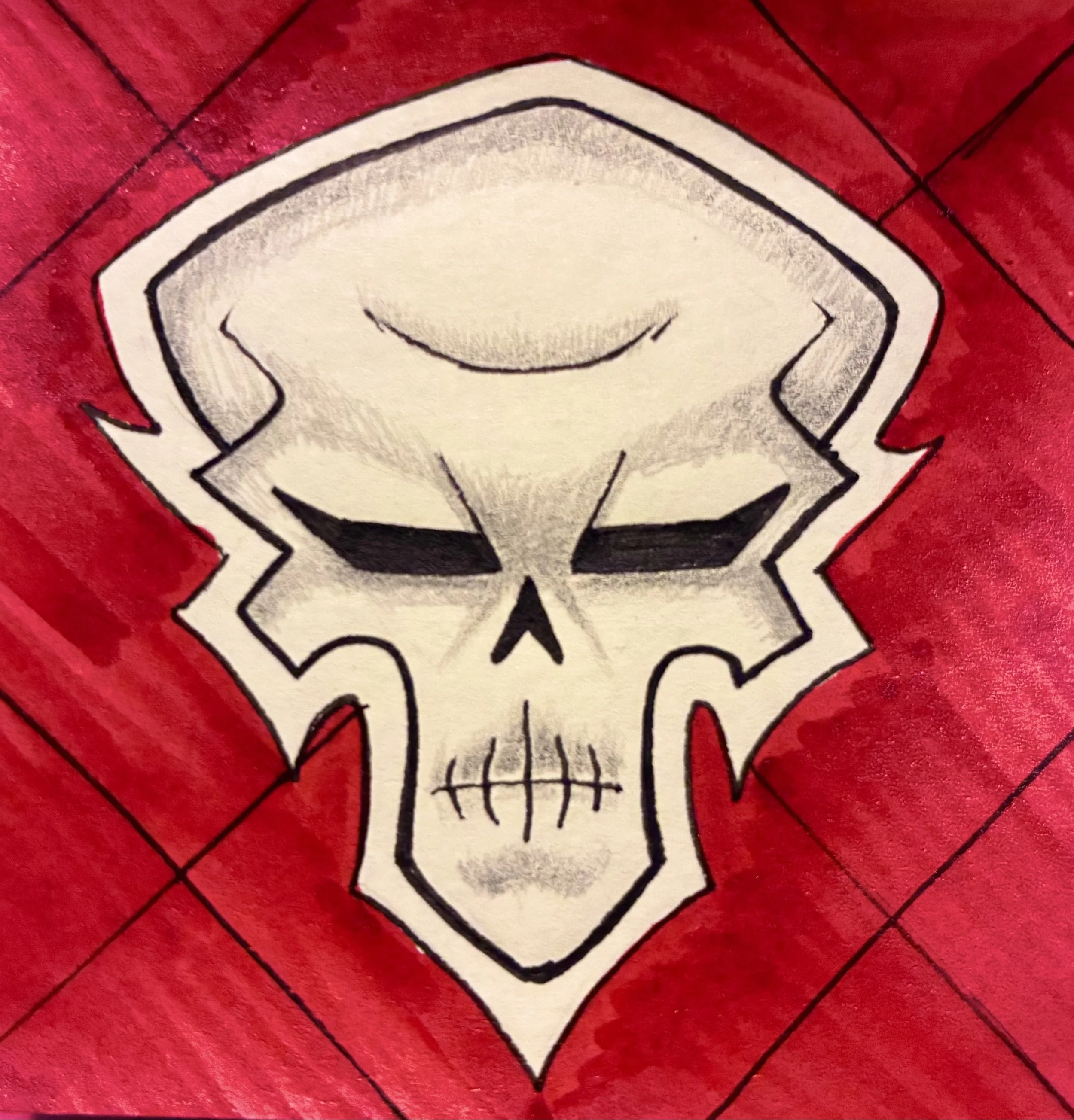 Close-up of a drawing featuring a comic-style skull with a frowning face, encased in a black outline, against a red background.