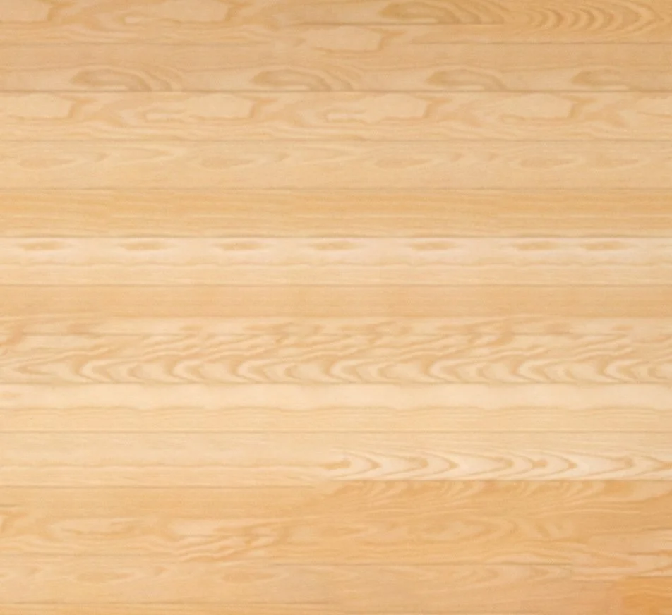 Light-colored wooden floor with visible grain pattern.